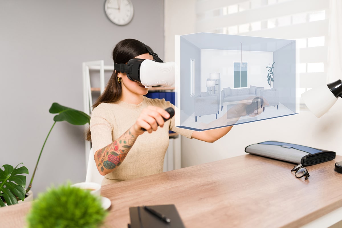 A home shopper in Arizona experiences a virtual home tour using VR technology, highlighting a 3D projection of a modern living room.